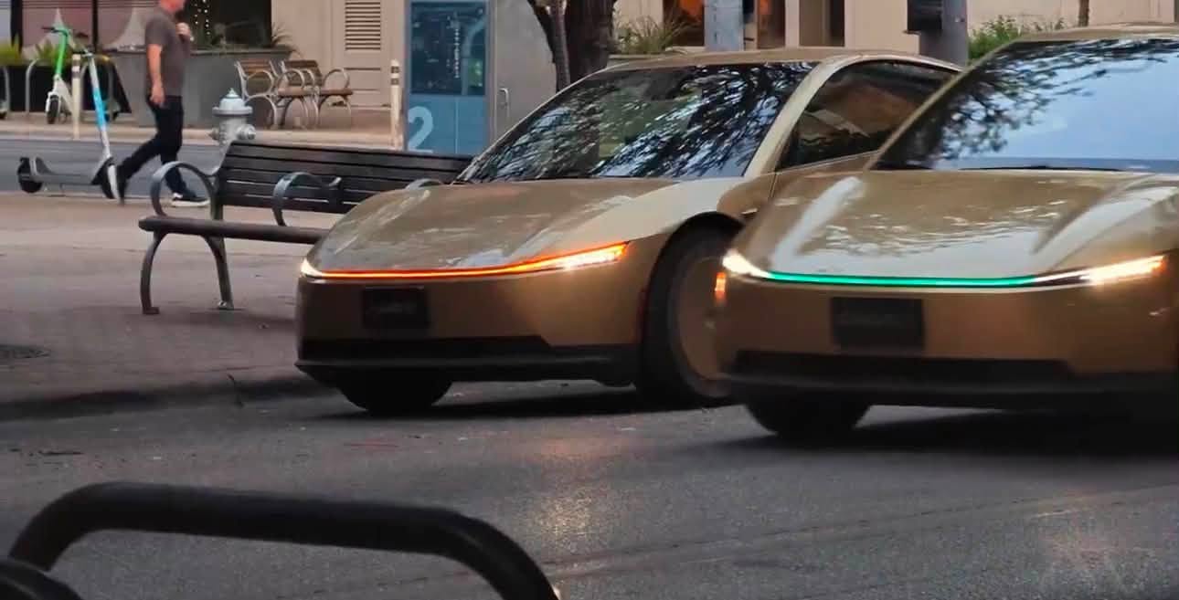 Teslarati: Cybercab pickup ID uses a color-coded front light bar matched in the app
